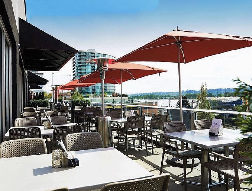 An outdoor patio with umbrellas