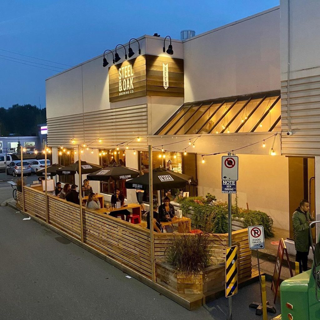 A patio at evening with lights